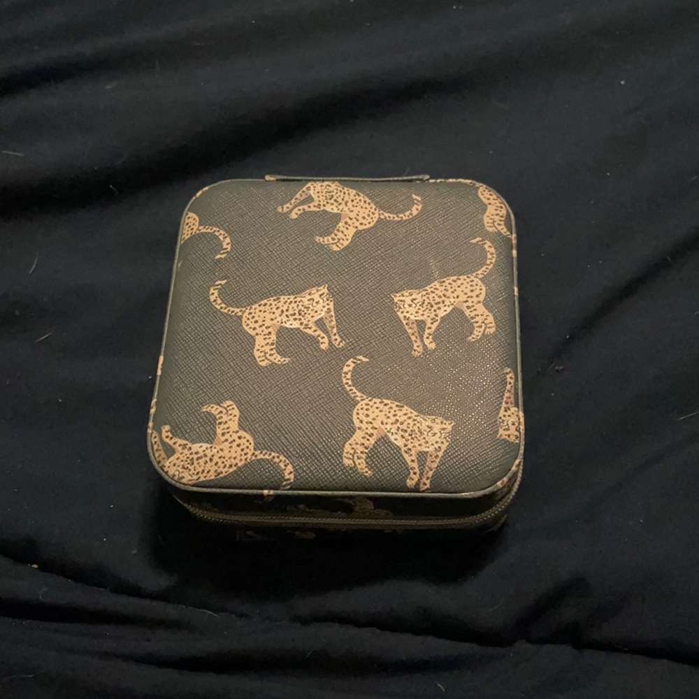 Mini jewelry box with compartments for rings, bracelets, necklaces